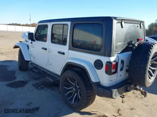 2019 Jeep Wrangler Unlimited Sahara with VIN 1C4HJXEN1KW687924, listed as a IAAI auction lot 41082030 with 65,852 mi miles. Bid and sale history available at carsss.com. Image 3.