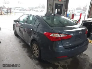 2014 Kia Forte LX with VIN KNAFX4A69E5237321, listed as a IAAI auction lot 41534280 with 100,810 mi miles. Bid and sale history available at carsss.com. Image 3.