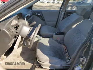 2004 Saturn L with VIN 1G8JC54F04Y519624, listed as a Copart auction lot 77407384 with Not Provided miles and Salvage Title. Bid and sale history available at carsss.com. Image 7.