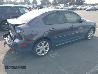 2007 Mazda 3 S Touring with VIN JM1BK324771626363, listed as a IAAI auction lot 41487684 with 220,889 mi miles and . Bid and sale history available at DreamBid. Image 4.
