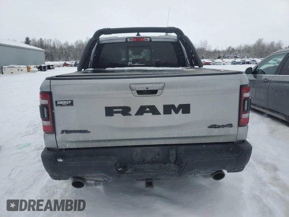 2022 Ram 1500 Rebel z VIN 1C6SRFLT4NN269031, wystawiony jako Copart lot #42962065 z przebiegiem 37 925 mil mil oraz Czysty tytuł • Clean title. Historia ofert i sprzedaży dostępna na DreamBid. Obrazek 6.