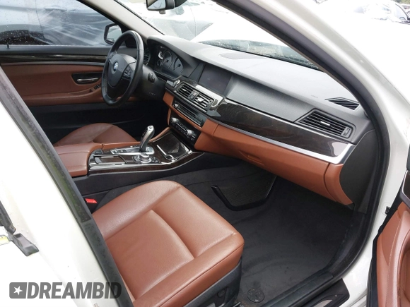 2013 BMW 5 Series 528i xDrive with VIN WBAXH5C54DDW13438, listed as a IAAI auction lot 41851954 with 122,653 mi miles. Bid and sale history available at carsss.com. Image 5.