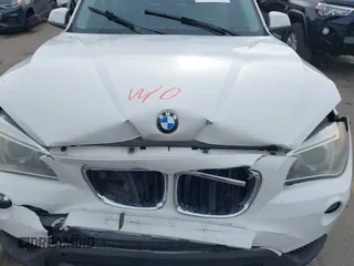 2014 BMW X1 xDrive28i z VIN WBAVL1C54EVY23533, wystawiony jako IAAI lot #41949759 z przebiegiem Nie podano mil oraz . Historia ofert i sprzedaży dostępna na DreamBid. Obrazek 10.