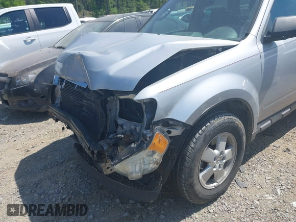 2011 Ford Escape XLT с VIN 1FMCU9DG9BKB50821, выставлен на аукционе IAAI как лот 42050075 с пробегом 101 946 миль миль и . История ставок и продаж доступна на DreamBid. Изображение 6.