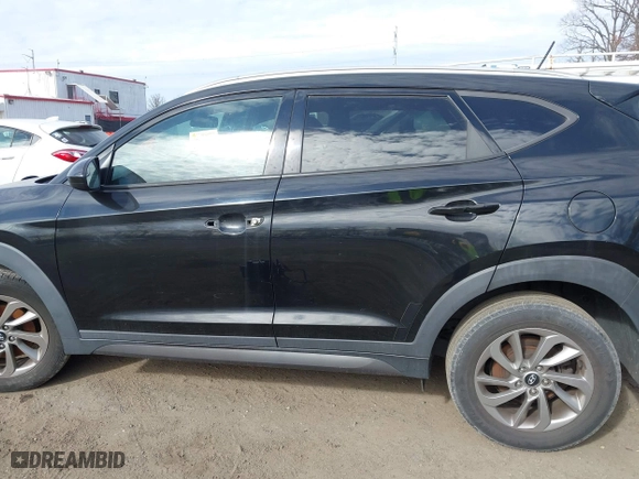 2016 Hyundai Tucson SE with VIN KM8J3CA42GU168610, listed as a IAAI auction lot 41639335 with 86,920 mi miles. Bid and sale history available at carsss.com. Image 13.