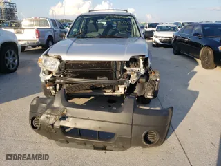 2005 Ford Escape XLS Value with VIN 1FMYU02Z75KB13387, listed as a Copart auction lot 40399594 with 148,579 mi miles and Salvage Title. Bid and sale history available at carsss.com. Image 9.