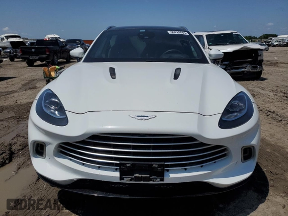 2021 Aston Martin DBX z VIN SCFVUJAW8MTV02781, wystawiony jako Copart lot #56249665 z przebiegiem 19 901 mil mil oraz Szkoda całkowita • Salvage title. Historia ofert i sprzedaży dostępna na DreamBid. Obrazek 5.
