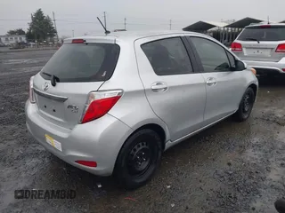 2013 Toyota Yaris L with VIN JTDKTUD32DD553842, listed as a IAAI auction lot 41231910 with 155,158 mi miles. Bid and sale history available at carsss.com. Image 4.