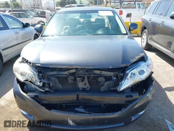 2012 Toyota Avalon with VIN 4T1BK3DB5CU445732, listed as a IAAI auction lot 42003711 with 117,526 mi miles and . Bid and sale history available at DreamBid. Image 6.