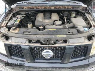 2006 Nissan Titan SE z VIN 1N6BA06AX6N546044, wystawiony jako Copart lot #57662705 z przebiegiem 207 161 mil mil oraz Czysty tytuł • Clean title. Historia ofert i sprzedaży dostępna na DreamBid. Obrazek 11.