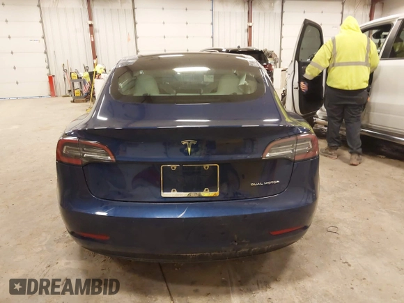 2018 Tesla Model 3 Long Range Battery with VIN 5YJ3E1EB7JF086201, listed as a IAAI auction lot 41965193 with 99,231 mi miles and . Bid and sale history available at DreamBid. Image 16.