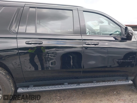 2022 Chevrolet Suburban Z71 with VIN 1GNSKDKD7NR345224, listed as a IAAI auction lot 42007246 with 50,300 mi miles and . Bid and sale history available at DreamBid. Image 14.