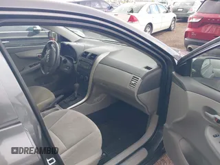 2009 Toyota Corolla with VIN JTDBL40E799040751, listed as a IAAI auction lot 42046821 with 199,634 mi miles. Bid and sale history available at carsss.com. Image 5.