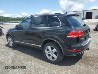 2011 Volkswagen Touareg z VIN WVGFG9BP5BD002225, wystawiony jako Copart lot #59926795 z przebiegiem 154 212 mil mil oraz Czysty tytuł • Clean title. Historia ofert i sprzedaży dostępna na DreamBid. Obrazek 2.