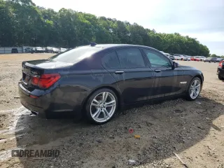 2015 BMW 7 Series 740i z VIN WBAYA6C56FGK16684, wystawiony jako Copart lot #55774275 z przebiegiem 85 281 mil mil oraz Szkoda całkowita • Salvage title. Historia ofert i sprzedaży dostępna na DreamBid. Obrazek 3.