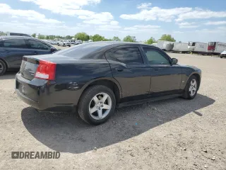 2009 Dodge Charger SXT with VIN 2B3KA33V09H503519, listed as a Copart auction lot 52825785 with 112,483 mi miles and Salvage Title. Bid and sale history available at carsss.com. Image 3.