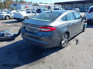 2018 Ford Fusion SE with VIN 3FA6P0HD3JR162709, listed as a IAAI auction lot 40989758 with 75,966 mi miles. Bid and sale history available at carsss.com. Image 4.