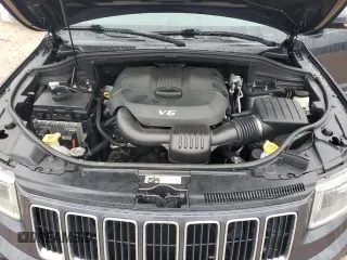 2014 Jeep Grand Cherokee Limited with VIN 1C4RJFBG2EC233725, listed as a Copart auction lot 58524505 with 216,798 mi miles and Salvage title. Bid and sale history available at DreamBid. Image 12.