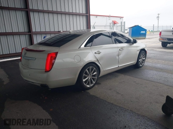 2014 Cadillac XTS Luxury with VIN 2G61M5S31E9210460, listed as a IAAI auction lot 41602087 with 1 mi miles. Bid and sale history available at carsss.com. Image 4.