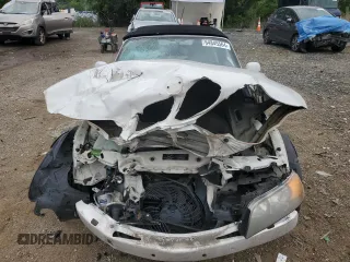 1999 BMW Z3 2.5 z VIN 4USCH9334XLF82884, wystawiony jako Copart lot #64845564 z przebiegiem 109 574 mil mil oraz Szkody całkowita. Historia ofert i sprzedaży dostępna na DreamBid. Obrazek 5.