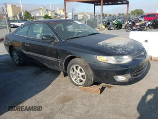 2000 Toyota Solara SE z VIN 2T1CG28PXYC277603, wystawiony jako IAAI lot #42410760 z przebiegiem 166 711 mil mil oraz . Historia ofert i sprzedaży dostępna na DreamBid. Obrazek 1.