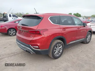 2019 Hyundai Santa Fe SE with VIN 5NMS2CAD5KH053852, listed as a IAAI auction lot 41962062 with 127,177 mi miles. Bid and sale history available at carsss.com. Image 4.
