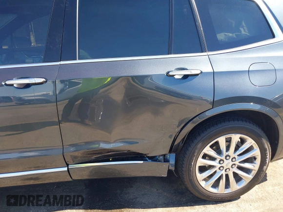 2021 Cadillac XT6 Premium Luxury with VIN 1GYKPERS0MZ110029, listed as a IAAI auction lot 41669104 with 58,890 mi miles and . Bid and sale history available at DreamBid. Image 6.
