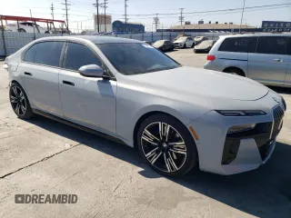 2023 BMW 7 Series 740i with VIN WBA23EH09PCM67327, listed as a Copart auction lot 73387174 with 18,228 mi miles and Salvage Title. Bid and sale history available at carsss.com. Image 4.