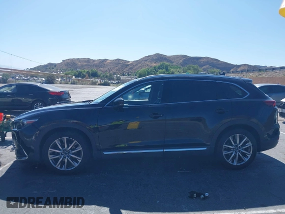 2017 Mazda CX-9 Grand Touring with VIN JM3TCBDY0H0130671, listed as a IAAI auction lot 42514237 with 81,016 mi miles and . Bid and sale history available at DreamBid. Image 14.