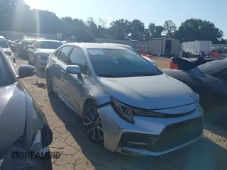 2021 Toyota Corolla SE with VIN 5YFS4MCE4MP085710, listed as a IAAI auction lot 40217536 with 70,066 mi miles. Bid and sale history available at carsss.com. Image 1.