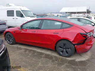 2023 Tesla Model 3 with VIN 5YJ3E1EA2PF476140, listed as a IAAI auction lot 41789189 with 33,435 mi miles. Bid and sale history available at carsss.com. Image 14.