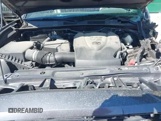 2017 Toyota Tacoma SR5 with VIN 5TFAZ5CN7HX033594, listed as a IAAI auction lot 41881117 with 86,676 mi miles and . Bid and sale history available at DreamBid. Image 10.