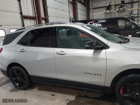 2021 Chevrolet Equinox Premier with VIN 2GNAXNEV5M6119300, listed as a IAAI auction lot 41464166 with 76,462 mi miles. Bid and sale history available at carsss.com. Image 14.