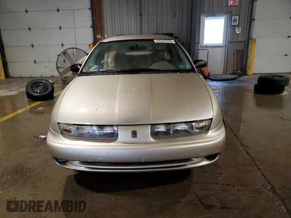 1996 Saturn SL z VIN 1G8ZK5274TZ233706, wystawiony jako Copart lot #54247795 z przebiegiem 62 941 mil mil oraz Czysty tytuł • Clean title. Historia ofert i sprzedaży dostępna na DreamBid. Obrazek 5.