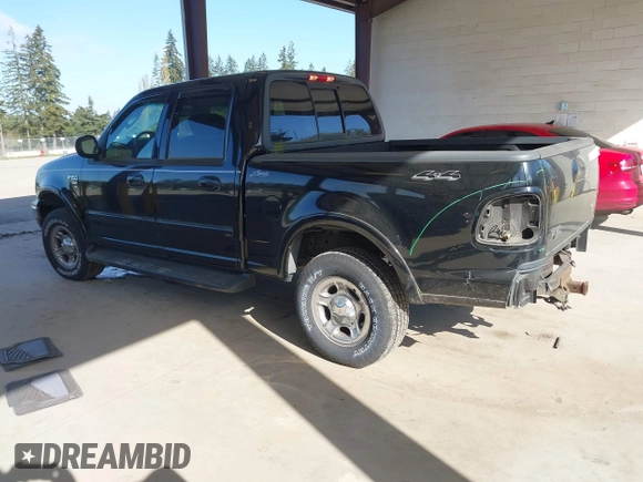 2002 Ford F-150 XLT with VIN 1FTRW08L92KD75087, listed as a IAAI auction lot 41960331 with 1 mi miles. Bid and sale history available at carsss.com. Image 3.