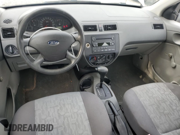 2005 Ford Focus S with VIN 1FAFP34N55W115653, listed as a Copart auction lot 63043315 with 110,593 mi miles and Salvage title. Bid and sale history available at DreamBid. Image 8.