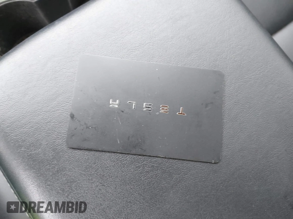 2019 Tesla Model 3 Mid Range with VIN 5YJ3E1EA3KF313425, listed as a IAAI auction lot 41806388 with 110,767 mi miles and . Bid and sale history available at carsss.com. Image 11.