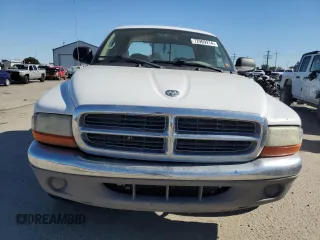 2004 Dodge Dakota SLT z VIN 1D7HL48N94S674827, wystawiony jako Copart lot #72969214 z przebiegiem 248 387 mil mil oraz Szkoda całkowita • Salvage title. Historia ofert i sprzedaży dostępna na DreamBid. Obrazek 5.