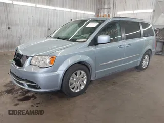 2013 Chrysler Town & Country Touring with VIN 2C4RC1BG9DR705471, listed as a IAAI auction lot 42037203 with 313,822 mi miles. Bid and sale history available at carsss.com. Image 2.