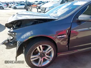 2008 Pontiac G8 with VIN 6G2ER57798L988697, listed as a IAAI auction lot 41690384 with 166,798 mi miles. Bid and sale history available at carsss.com. Image 20.