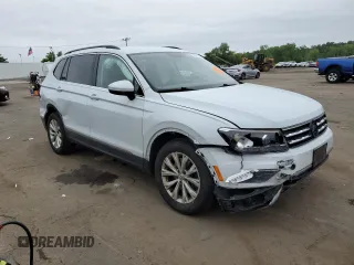 2018 Volkswagen Tiguan SEL with VIN 3VV2B7AX3JM185619, listed as a Copart auction lot 59421195 with 164,431 mi miles and Salvage title. Bid and sale history available at DreamBid. Image 4.