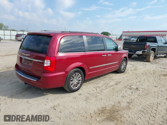 2016 Chrysler Town & Country Touring-L with VIN 2C4RC1CG7GR221690, listed as a IAAI auction lot 42038763 with 188,184 mi miles. Bid and sale history available at carsss.com. Image 4.