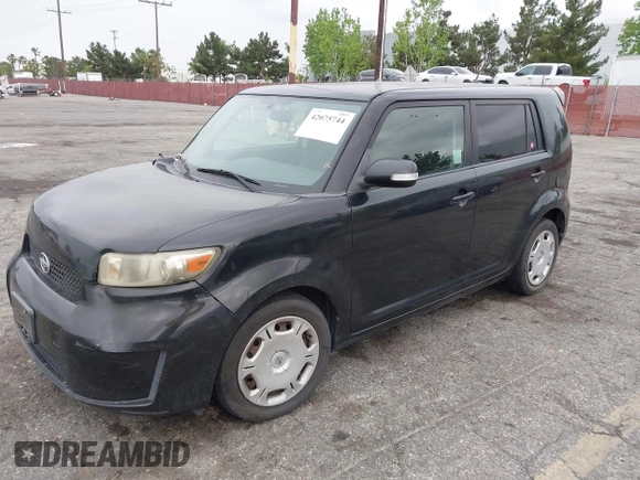 2009 Scion xB with VIN JTLKE50E791068407, listed as a IAAI auction lot 42075744 with 199,789 mi miles. Bid and sale history available at carsss.com. Image 2.