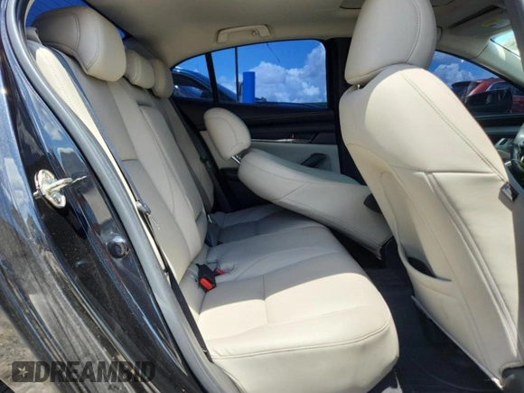 2022 Mazda 3 2.5 Turbo z VIN 3MZBPBAY9NM305244, wystawiony jako Copart lot #63661025 z przebiegiem 89 066 mil mil oraz Czysty tytuł • Clean title. Historia ofert i sprzedaży dostępna na DreamBid. Obrazek 10.