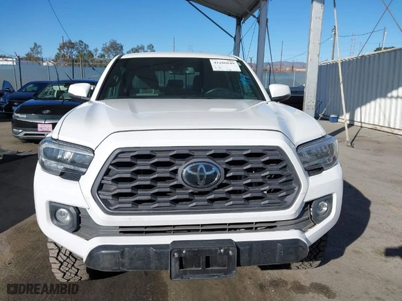 2021 Toyota Tacoma 2WD SR5 with VIN 3TMAZ5CN7MM144212, listed as a IAAI auction lot 41286049 with 75,113 mi miles. Bid and sale history available at carsss.com. Image 12.