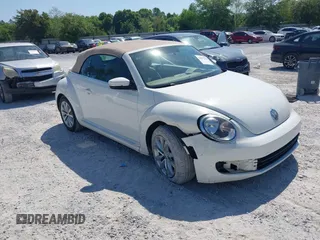 2013 Volkswagen Beetle 2.5L with VIN 3VW5P7AT3DM811617, listed as a IAAI auction lot 42055769 with 93,810 mi miles and . Bid and sale history available at DreamBid. Image 1.