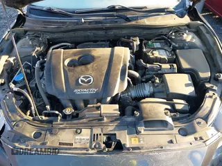 2018 Mazda 3 Touring with VIN 3MZBN1L32JM235162, listed as a IAAI auction lot 41596278 with 144,784 mi miles and . Bid and sale history available at DreamBid. Image 10.