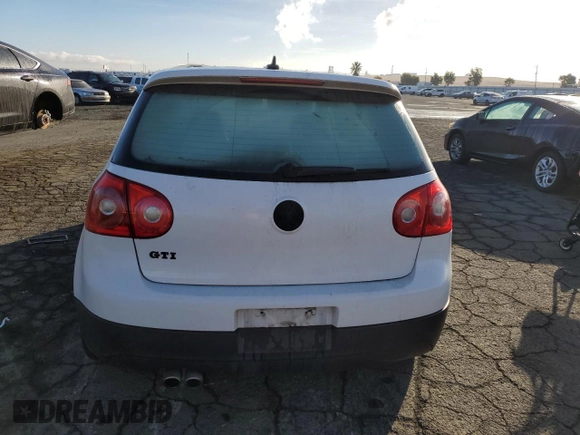 2009 Volkswagen GTI z VIN WVWHD71KX9W061673, wystawiony jako Copart lot #80168754 z przebiegiem 153 396 mil mil oraz Czysty tytuł • Clean title. Historia ofert i sprzedaży dostępna na DreamBid. Obrazek 6.