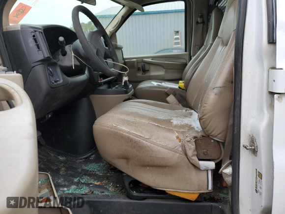2005 Chevrolet Express Cargo z VIN 1GCFG15X051168059, wystawiony jako Copart lot #88302095 z przebiegiem Nie podano mil oraz Szkoda całkowita • Salvage title. Historia ofert i sprzedaży dostępna na DreamBid. Obrazek 7.