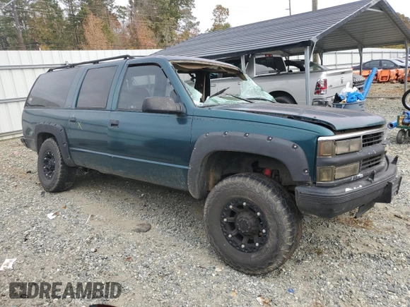 1995 Chevrolet Suburban with VIN 1GNFK16K0SJ430411, listed as a Copart auction lot 79208624 with 316,229 mi miles and Salvage Title. Bid and sale history available at carsss.com. Image 4.